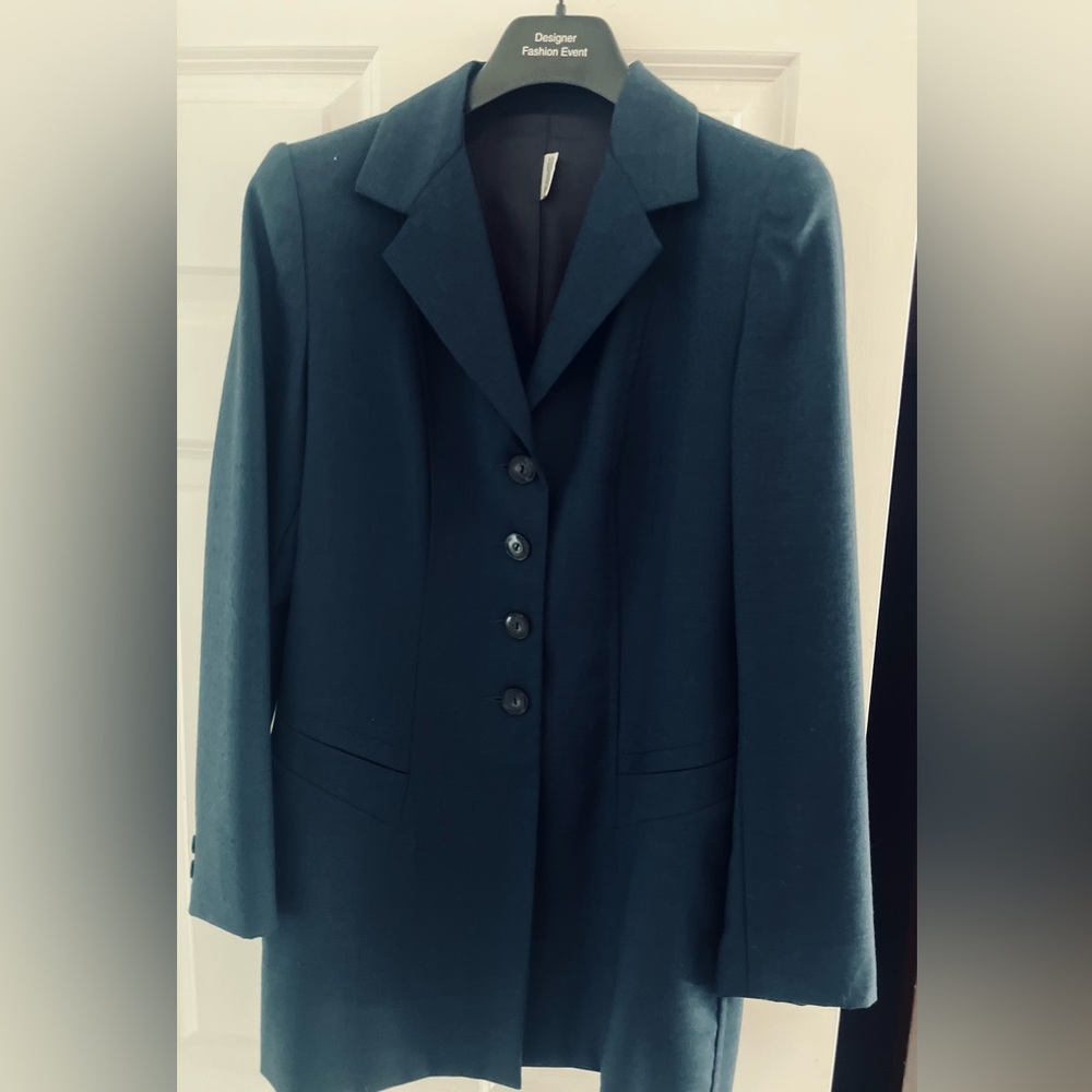Not available til April

Ladies Navy pantsuit